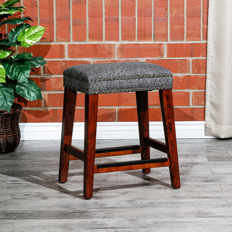 Élégant tabouret de comptoir de 24 po sans dossier avec des pieds au design classique et un rembourrage de siège confortable
