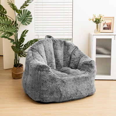 Fauteuil à billes et méridienne en fausse fourrure