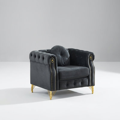Luxury Velvet Chesterfield Sofa with Tufted Detailing and Decorative Metal Legs