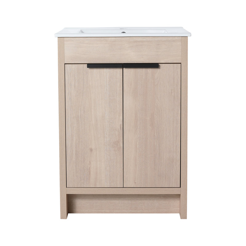 Meuble-lavabo autoportant avec lavabo en céramique et portes d'armoire à fermeture en douceur, un ajout élégant et fonctionnel à votre salle de bain.