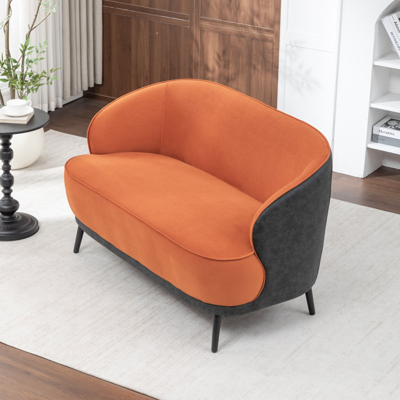 Causeuse en velours avec pieds noirs Stith, Orange / noir