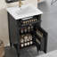 Meuble-lavabo noir de 50 cm avec lavabo, pieds en bois massif, tiroir inclinable, étagère réglable, alliage de zinc, charnières à fermeture douce, style moderne autoportant pour salles de bain compactes, fini doré, idéal pour les petits espaces.