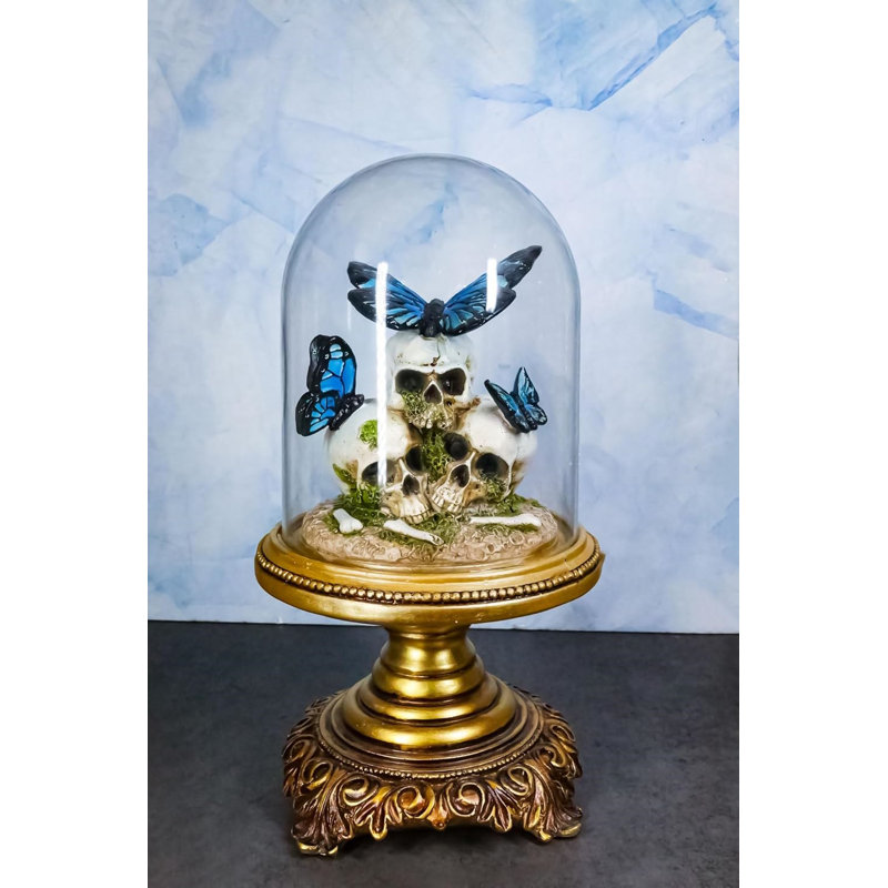 Figurine macabre crâne avec papillons monarques
