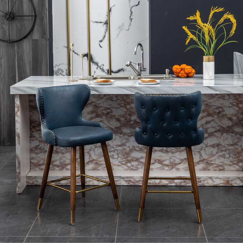 Tabouret de comptoir moderne Mid-Century 2 pièces, similicuir bleu, bouton, garniture cloutée, pieds en noyer, cuir doré - repose-pieds - garniture élégante