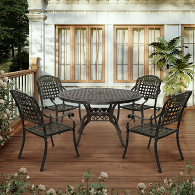 Rhedyn 4 - Person Round Outdoor Cast Aluminum Dining Set with Umbrella Hole