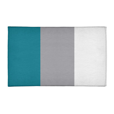 Tapis gris/bleu à rayures