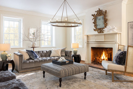 A cozy living room with a velvet sofa.