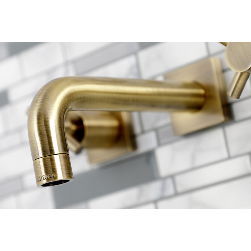 Kingston Brass Concord Two-Handle 3-Hole Wall Mount Bathroom Faucet, Antique Brass, Cross