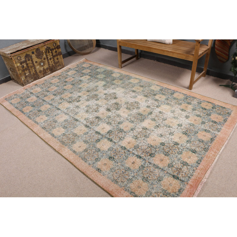 Faites briller votre espace de vie avec ce tapis turc floral fait à la main pour une atmosphère bohème chic
