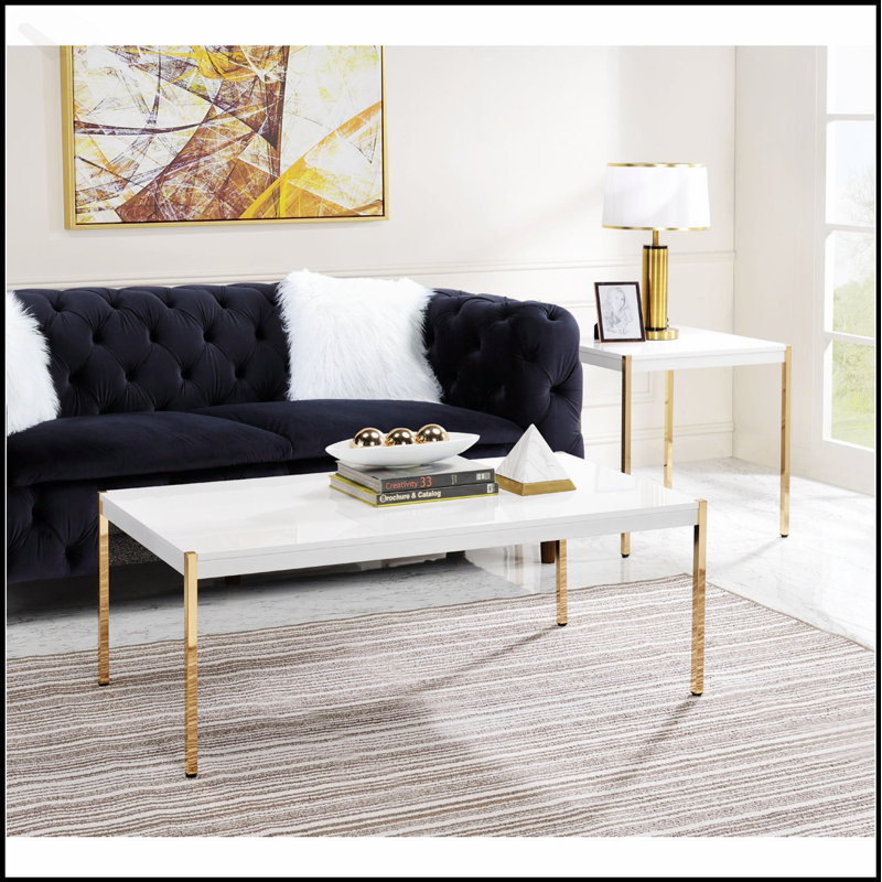 Table basse rectangulaire en bois avec cadre en métal blanc et doré élégant, parfaite pour les espaces de vie modernes.