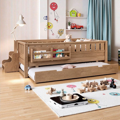 Lit simple pour enfant avec bibliothèque intégrée, escalier, barrière de sécurité et lit gigogne pour les chambres ludiques et fonctionnelles