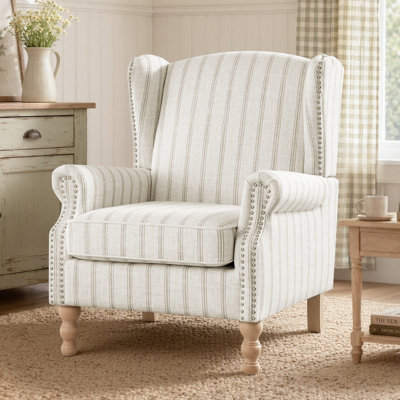 Fauteuil d'appoint à oreilles extra large Chloris, fauteuil rembourré en lin de style Mid-Century avec garniture cloutée cloutée, pieds en bois massif tourné, fauteuil de lecture de style maison de campagne