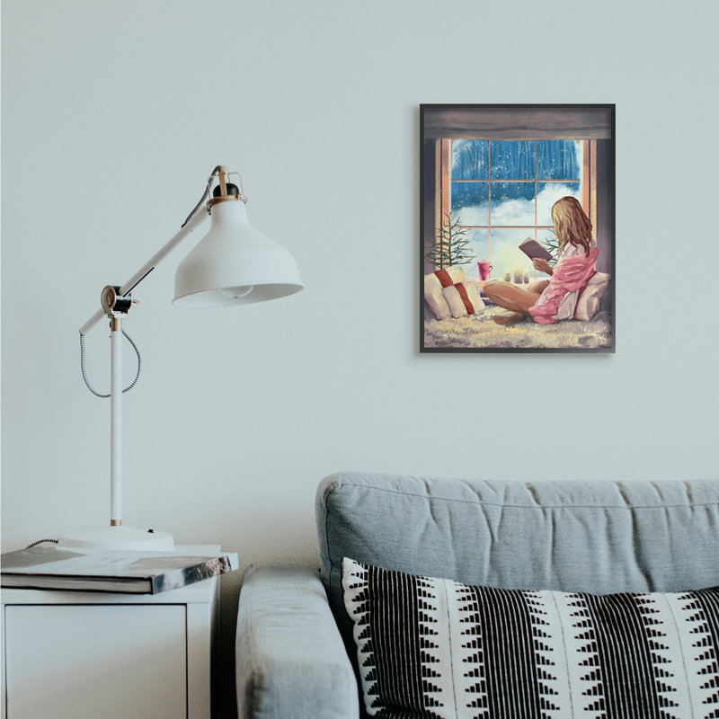 Fille lisant par une fenêtre d'hiver enneigée, Giclée encadrée noir minuit, H 20 po x l 16 po