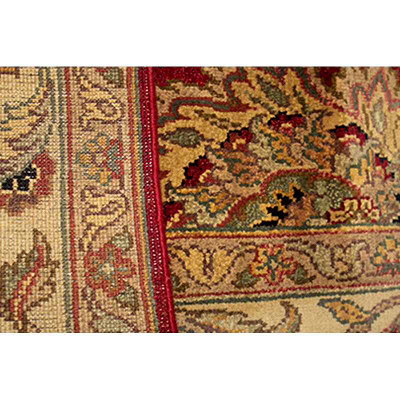 Tapis rouge et or de haute qualité noué à la main