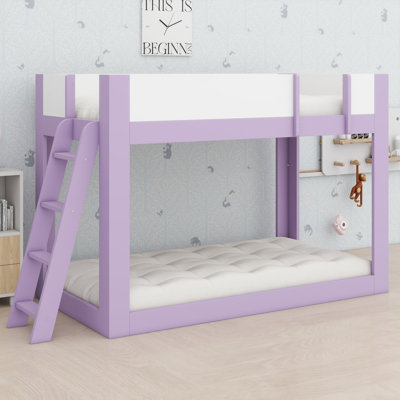 Bunk bed with reversible ladder and safety guardrails for low ceilings