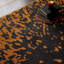 Alaisdair Splash Abstract Black Orange Area Rug-1643007206