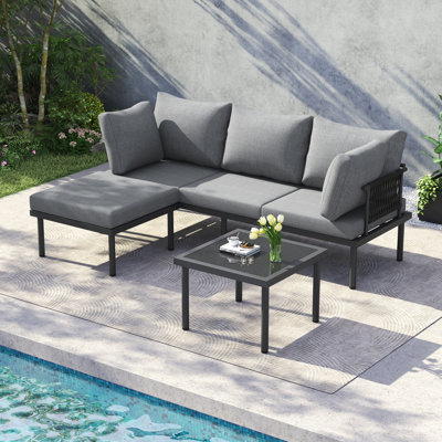 Corner Garden Furniture Set With Sofa, Coffee Table, And Footstool