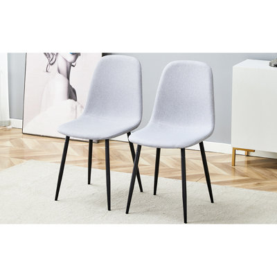 Chaise de salle à manger grise de 6 personnes - Décoration intérieure contemporaine. Conception ergonomique pour une utilisation durable, pieds en métal, patins réglables, processus d'assemblage simple, style moderne. Matériau respirant,