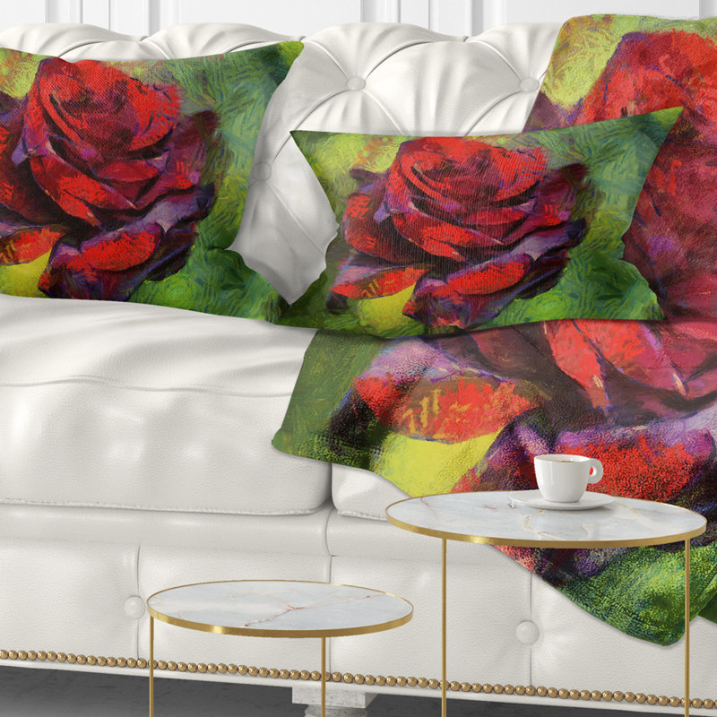 Coussin décoratif à imprimé floral rose rouge sur fond vert
