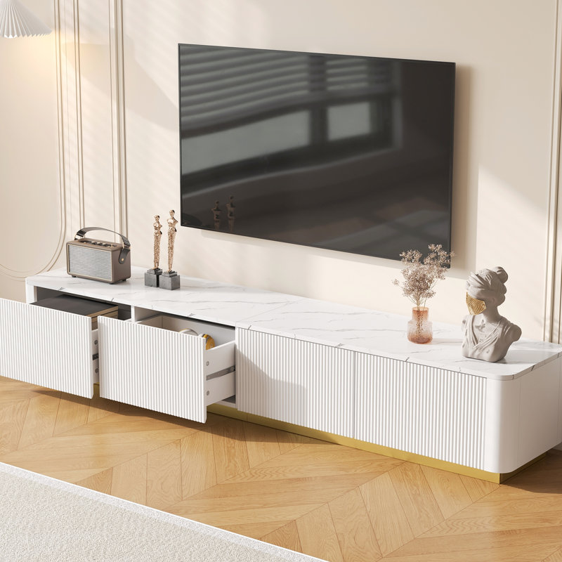 Meuble télé cannelé pour téléviseur de 85 po, 4 tiroirs, base dorée, placage en faux marbre blanc et cadre, Blanc