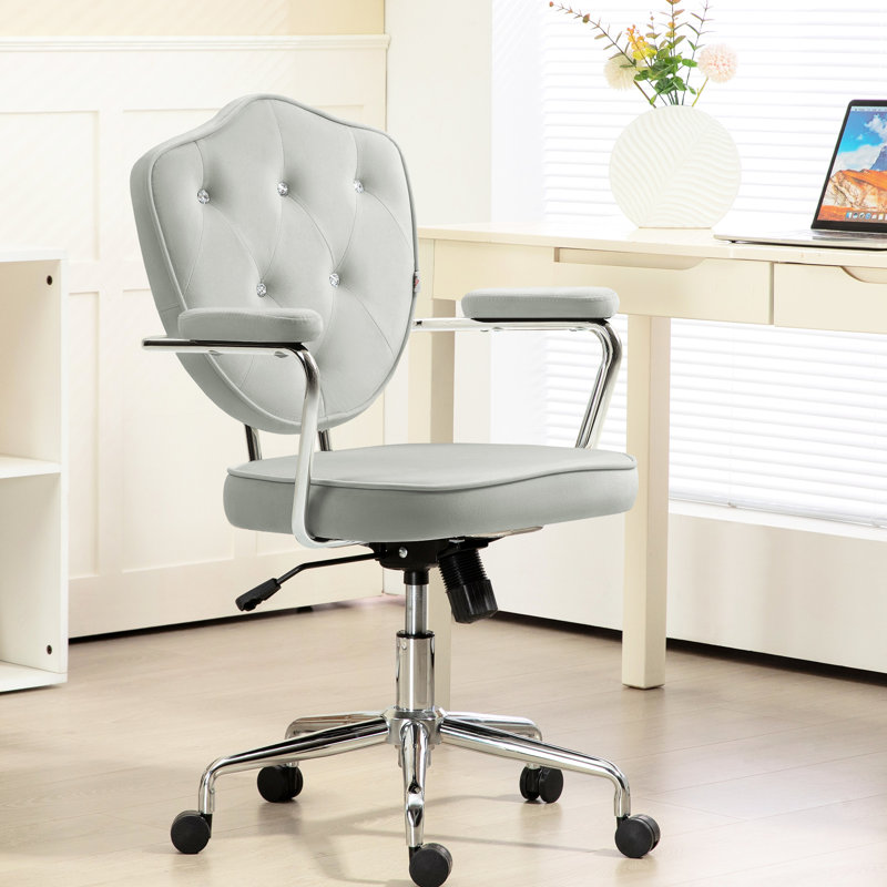 Fauteuil de bureau gris avec siège moelleux et inclinaison réglable