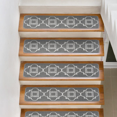 Tapis d'escalier gris