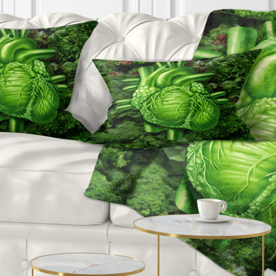 Coussin vert avec cœur en santé vert