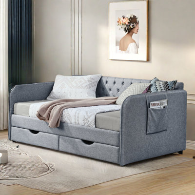 Upholstery Daybed With Trundle, Two Drawers , Side Pockets And Button Tufted Design by Red Barrel Studio