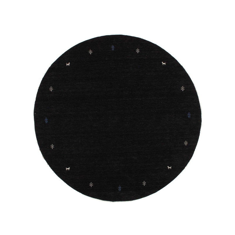 Kenjanae Area Rug in Black