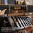 78.74" Solid Wood TV Stand for TVs up to 85", Mid-Century Modern Sliding Door Media Console with Arched Glass Doors, Black & Walnut Finish