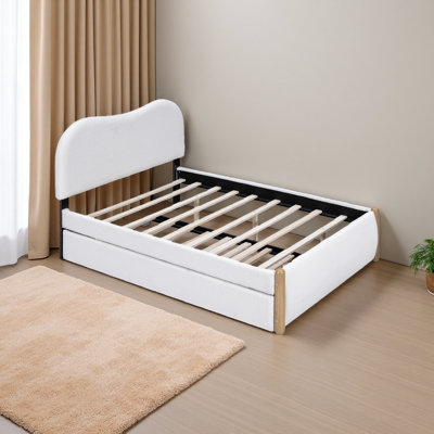 Lit plateforme tapissier avec pieds et gigogne en bois