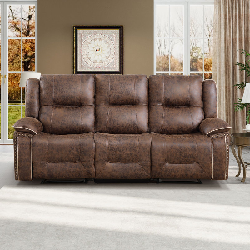 Almyra 88.1" Wide Vintage Faux Leather Manual Reclining Sofa with Nailhead Trim and Fixed Middle Seat