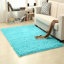 Tapis turquoise à poils longs Angelito