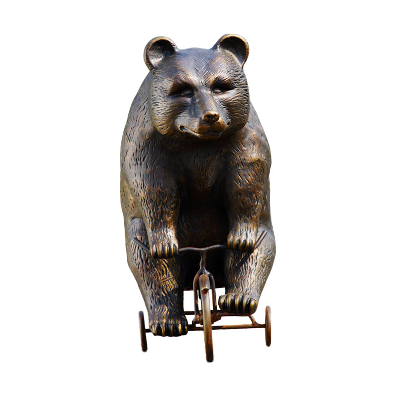 Statue big bear little tricycle