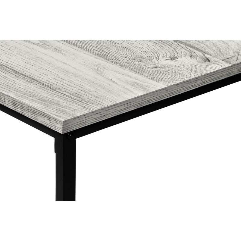Élégante table 3 pièces avec stratifié gris et détails en métal noir