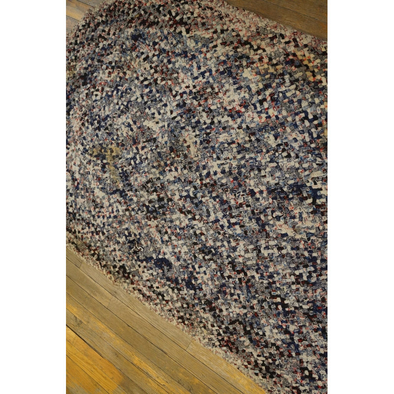 Tapis multicolore en laine tressé antique