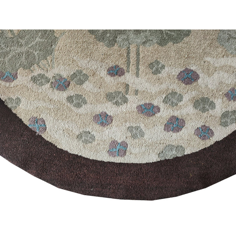 Tapis rond antique ivoire Art déco