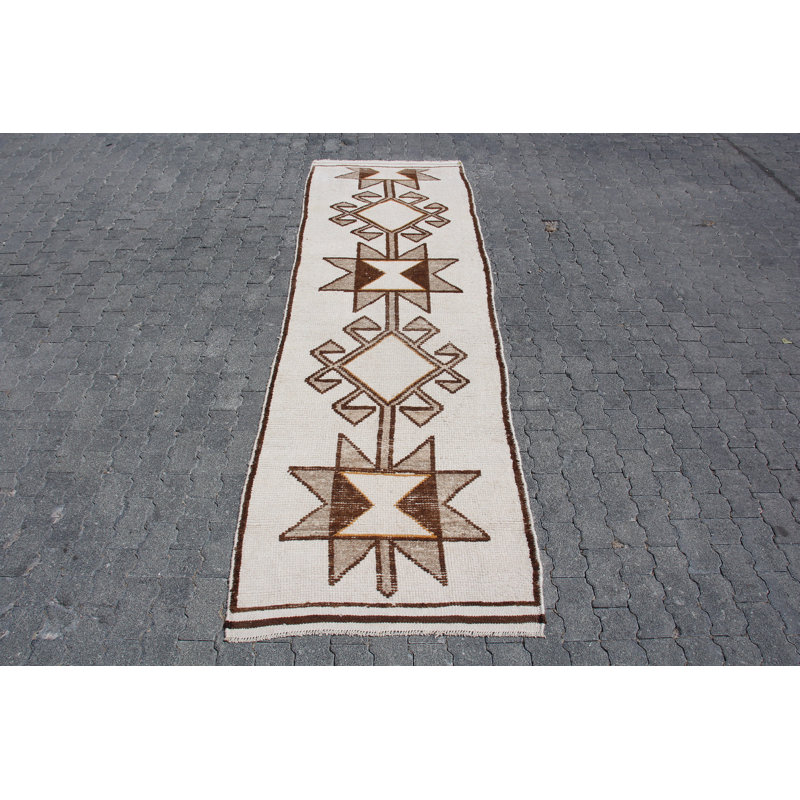 Tapis de couloir turc rétro dans des tons de terre riches pour les couloirs et les espaces étroits