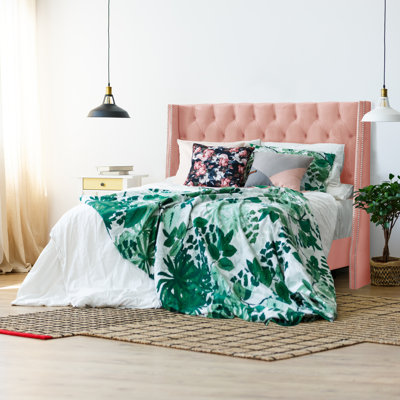 Avala Upholstered Wingback Bed