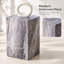 Table d'appoint moderne en bois aggloméré texturé gris pour votre espace de vie