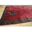 Tapis rouge antique à motif Art déco