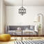 Lustre géométrique à 4 lumières de style bougie Atakan