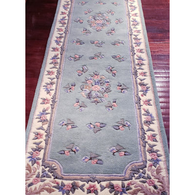 Tapis bleu clair / ivoire en laine touffeté à la main Floral