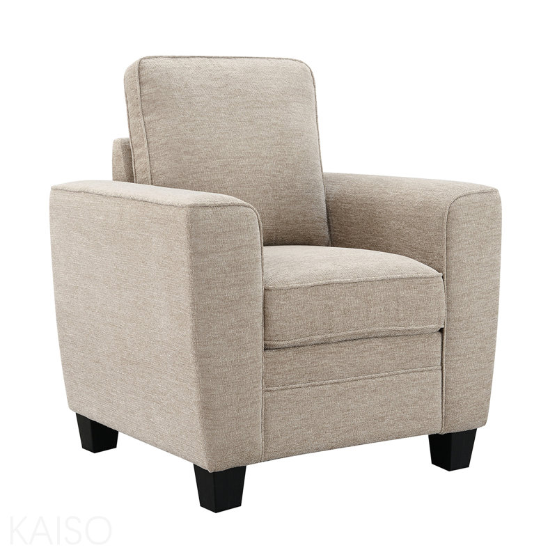 Fauteuil 1 pièce de style transitionnel avec accoudoirs souples et accoudoirs fuselés noirs, finition taupe, salon principal