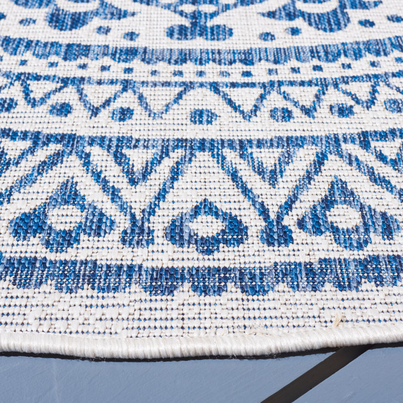 Tapis intérieur / extérieur ivoire / bleu marine Ellefson, Rond 6 pi 7 po