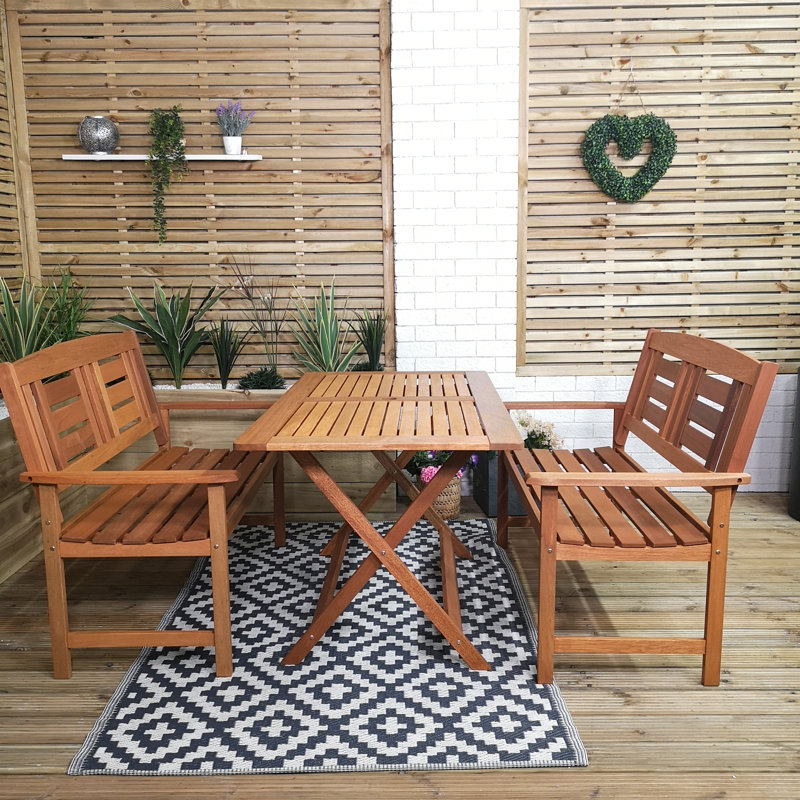 Aayushi 4 - Person Wood Patio Dining Set with