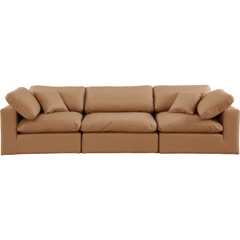 Hygema Upholstered 119'' Sofa, Cognac Vegan Leather