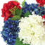 Arrangement d'hortensias rouges, blancs et bleus dans un pot en fibre de pierre