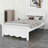 Wooden Platform Bed Featuring a Headboard