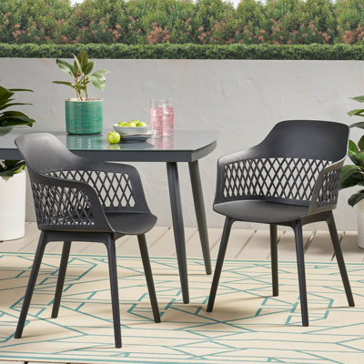Chaise Azalea pour l'extérieur, structure stable, minimaliste moderne, polypropylène noir, profondeur de 23 po, largeur de 21,5 po, hauteur de 33 po, chaise de 12,27 lb résistante aux intempéries, construction, courbe élégante, P 23,06 po, l 21,19 p